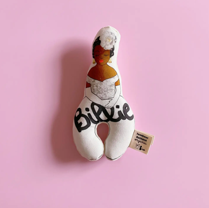 Soft fabric rattle with an illustration of Billie Holiday.