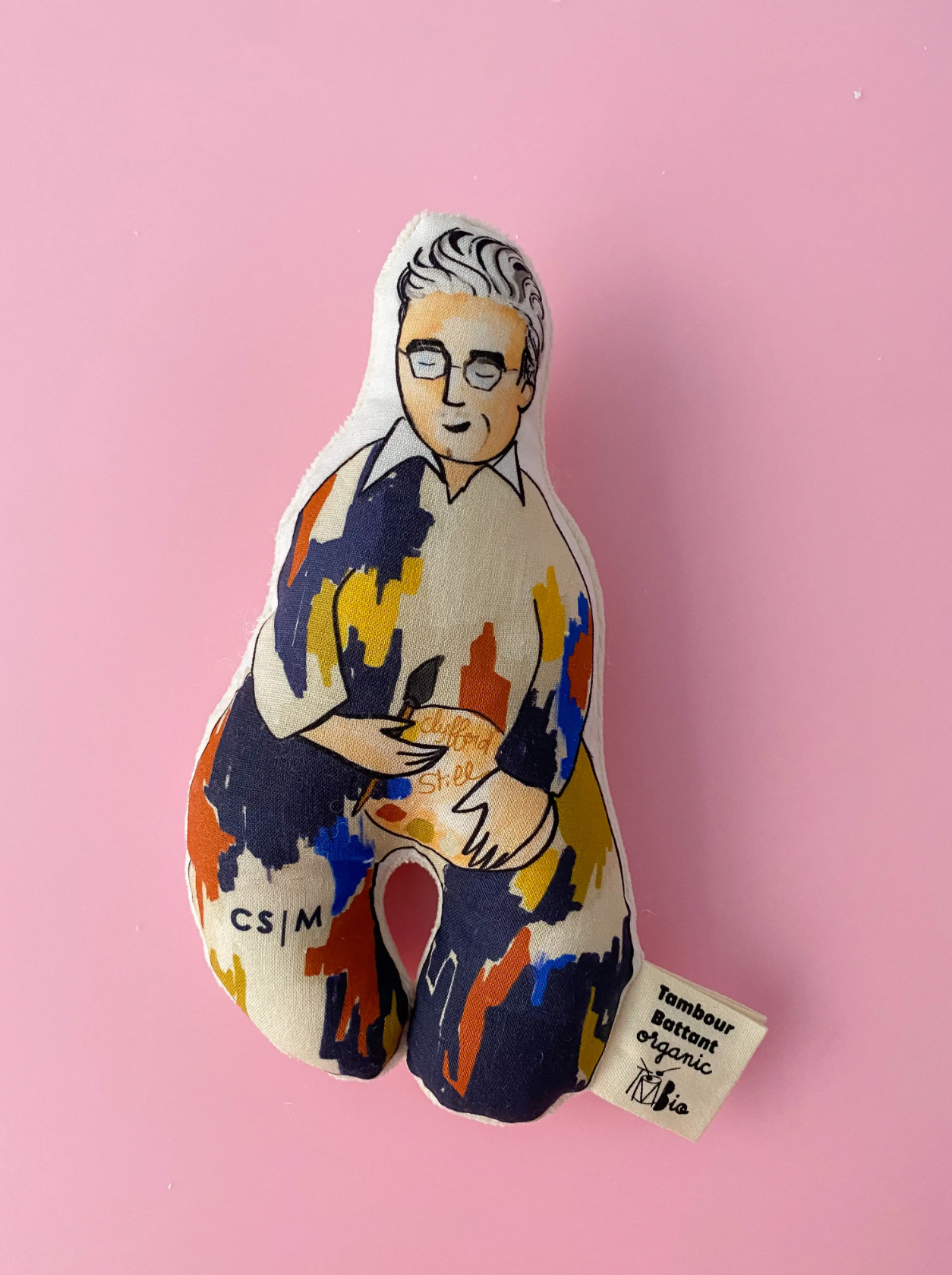 Soft fabric rattle with an illustration of Clyfford Still.