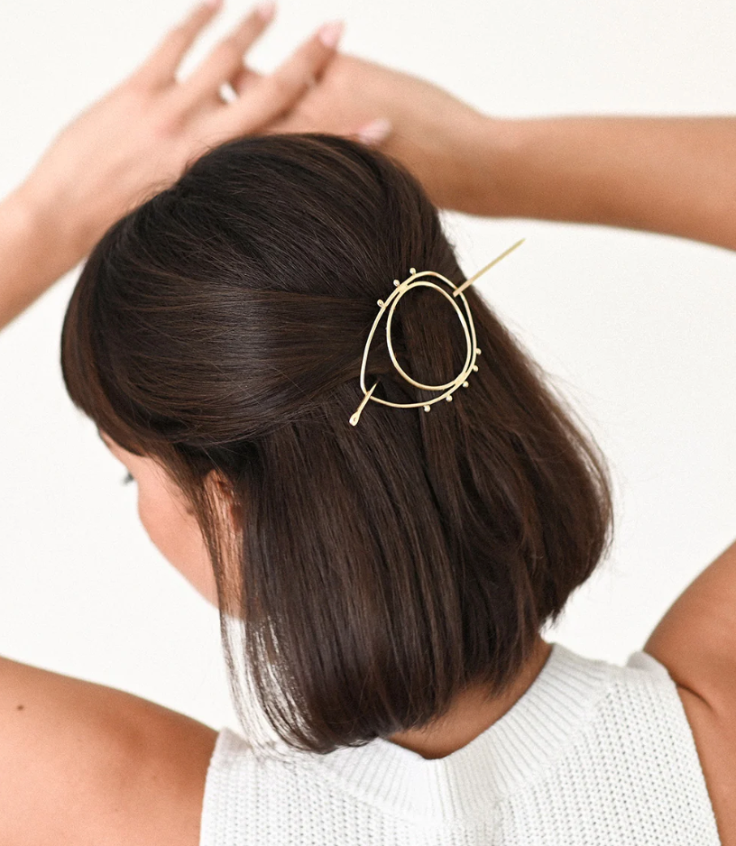 Model wearing Drishti Evil Eye Hair Slide with Stick/Gold