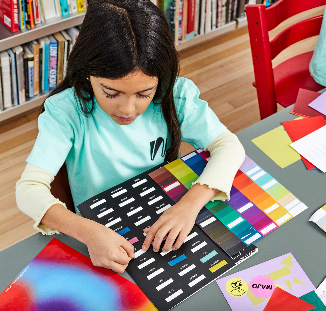 MAJO Activity Book being used.