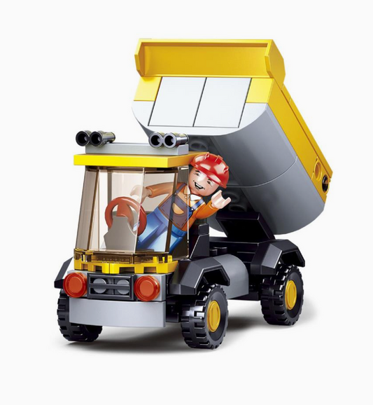 Toy dump truck with a driver figure on a white background