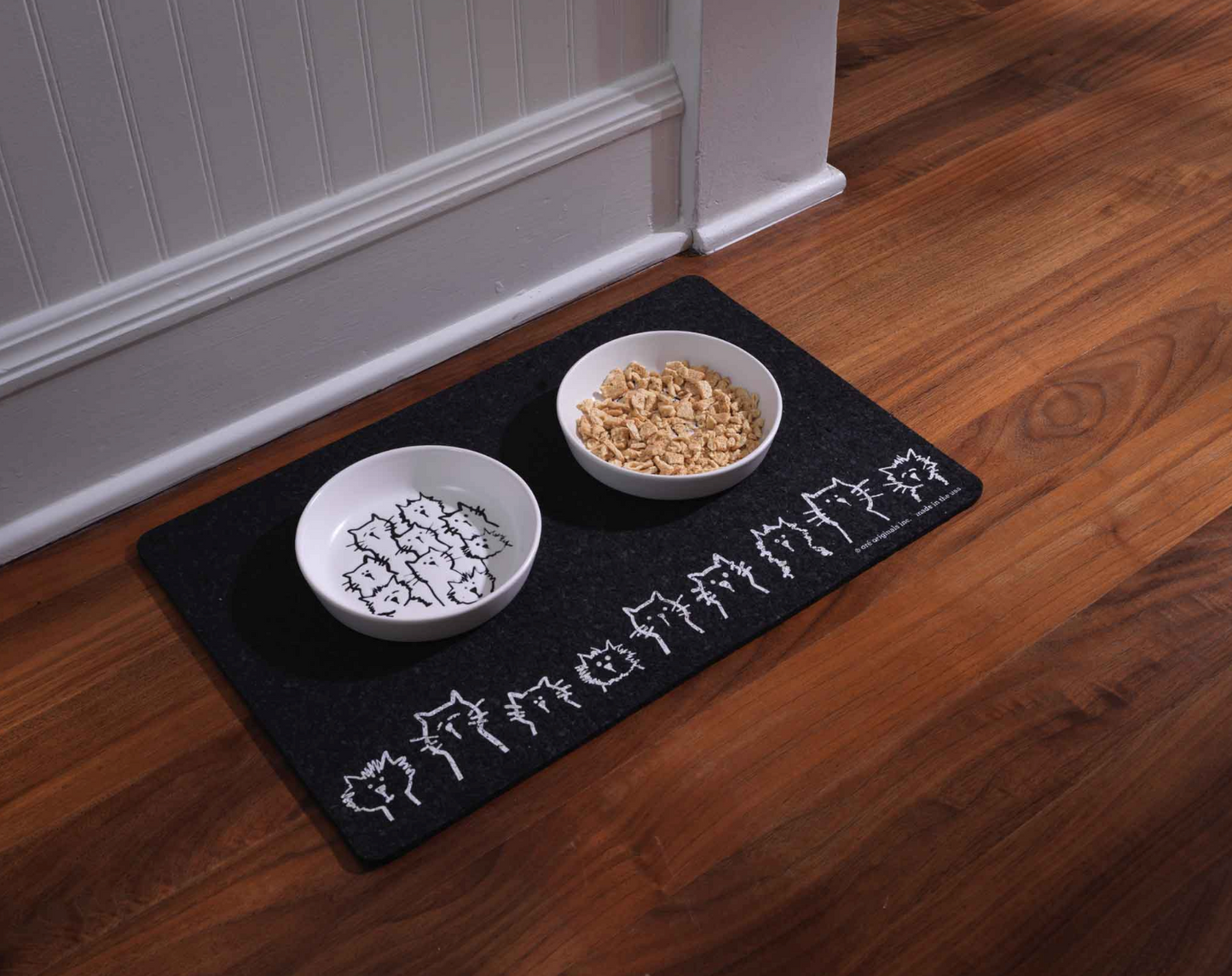 Image of Cat Treats on Cat Pet Mat.
