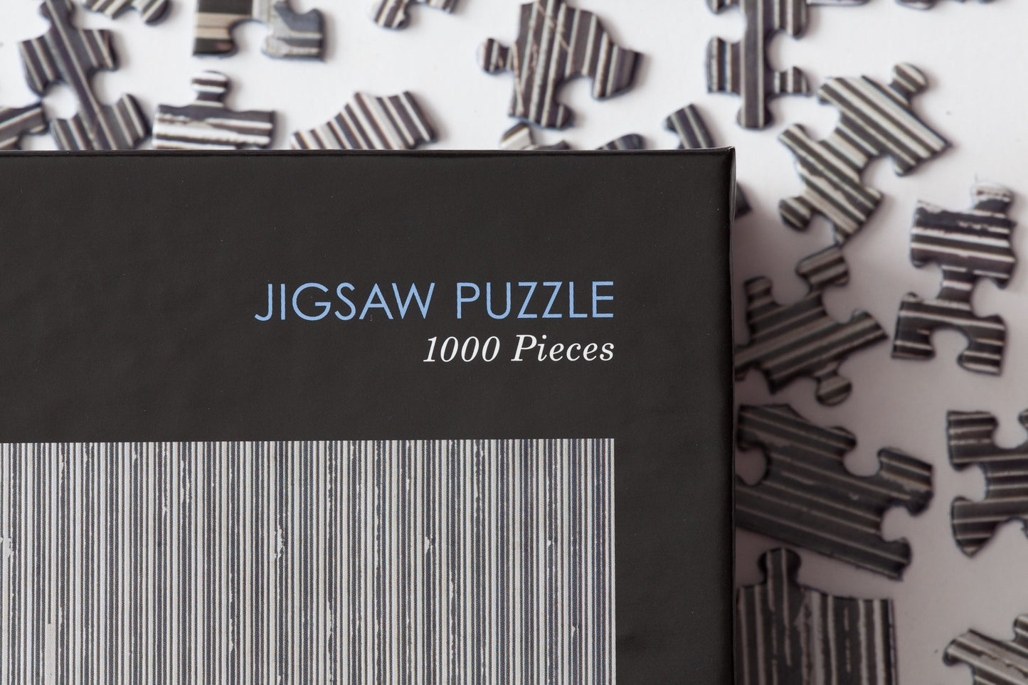 Text Displaying "Jigsaw Puzzle 1000 Pieces" on Jigsaw Puzzle, Clyfford Still Museum.