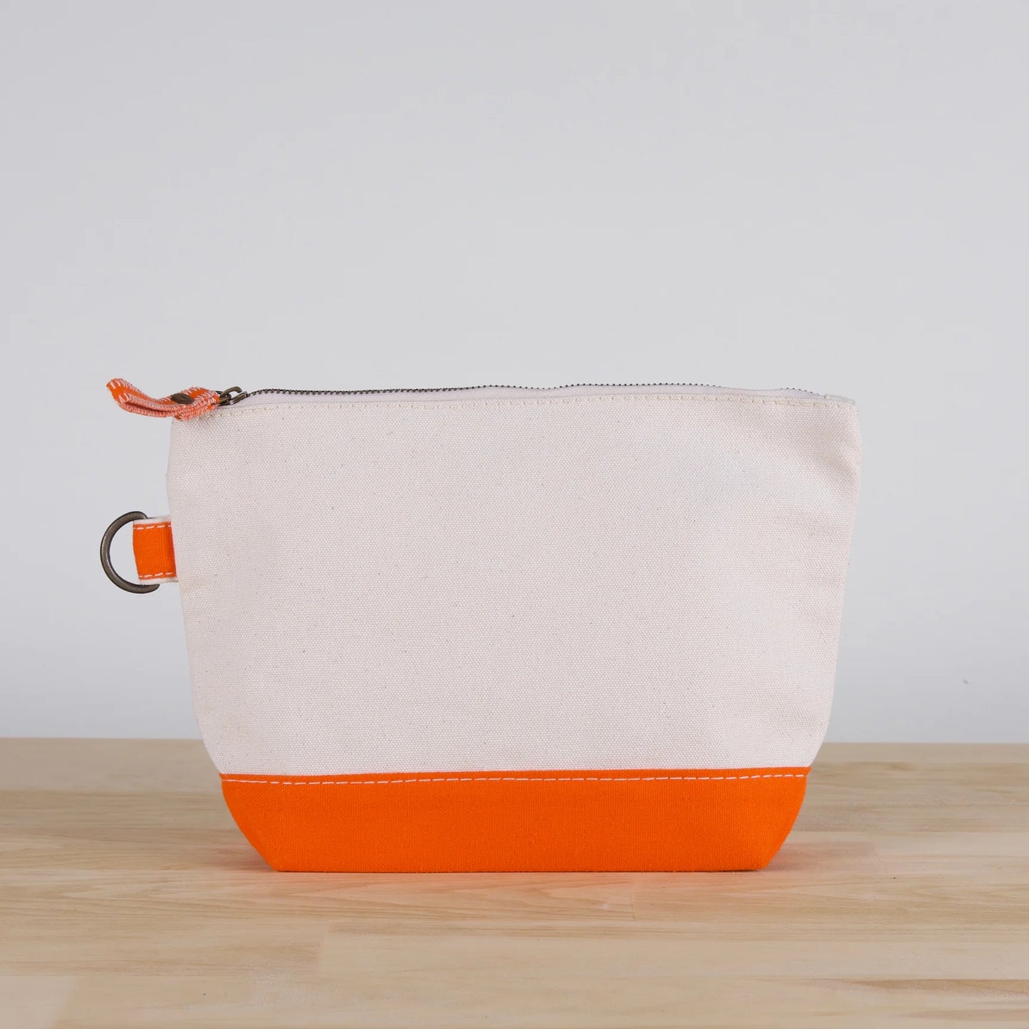 Back of Orange All In Zip Top Pouch.