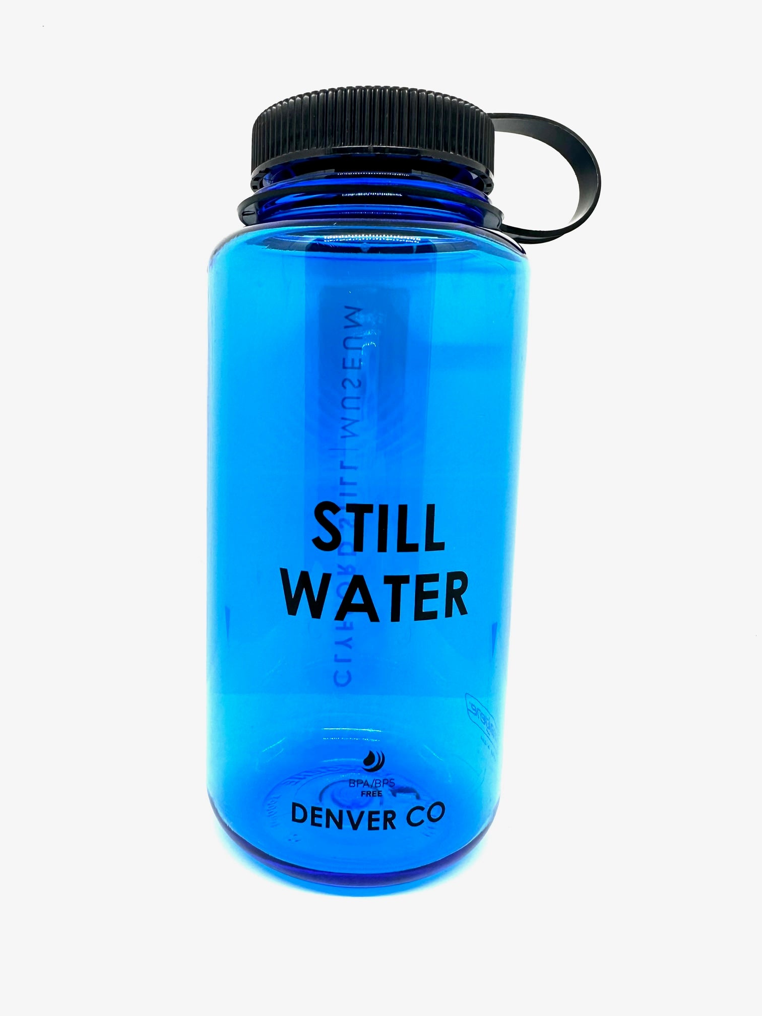 Slate blue with black cap Nalgene's classic 32oz wide-mouth water bottle with slogan “STILL WATER”.
