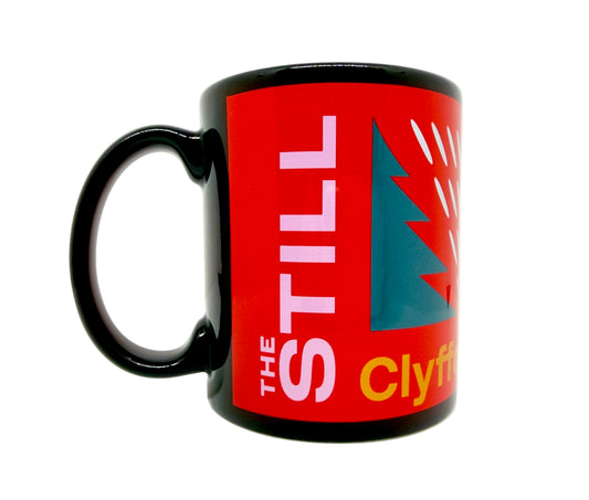 Black mug with red background featuring Museum logos, ceiling design and a tree on a white background.