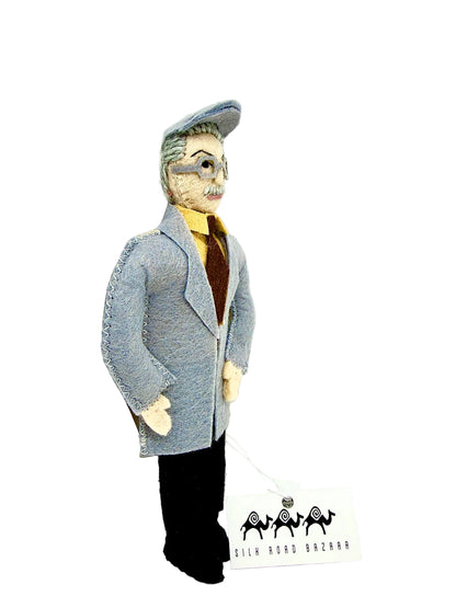 Stuffed toy figure of a man in a suit with a hat on a white background