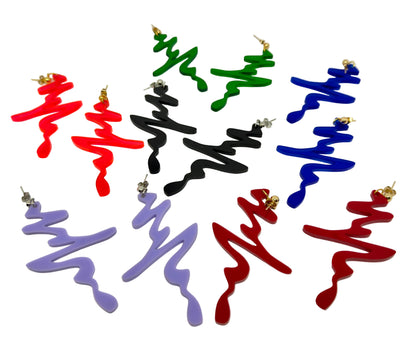 Colorful wavy earrings on a white background