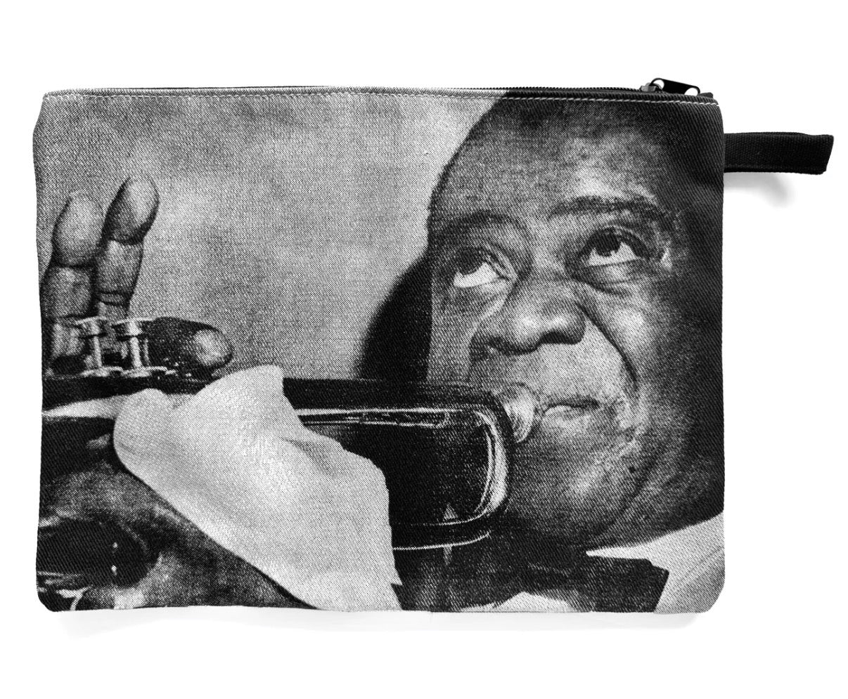 Pouch with a black and white image of a person playing a trumpet on a white background