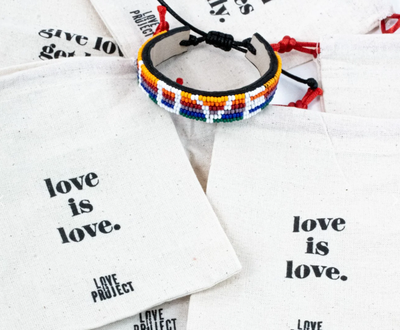 ‘Rainbow Love Project Bracelet’ with ‘Love is Love’ fabric bag