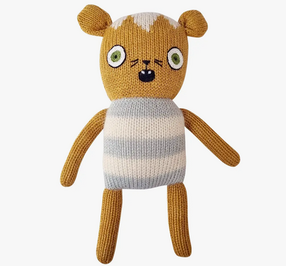 Mustard knitted ‘Tiger Soft Toy’ with light gray stripes. 