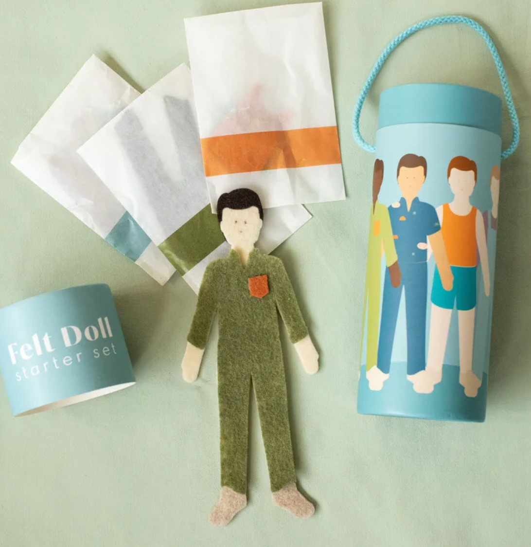 ‘Hazelnut Short Haired Felt Doll’ with accessories and tube packaging 