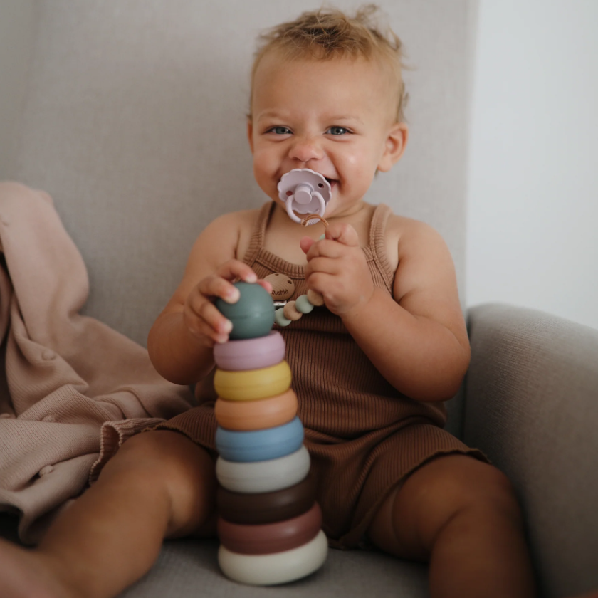 Baby playing with Stacking Rings Toy