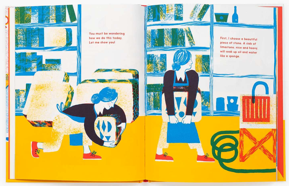 Inside page of “Meet the Lithographer” hardcover featuring primary color illustrations of an artist working in a studio.