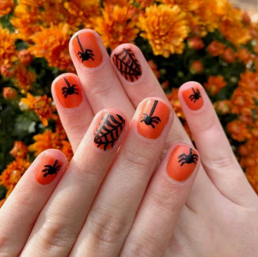 Halloween nails painted with Persimmon Palate Nail Polish