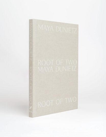 Book titled 'Root of Two' by Maya Dunietz on a white background