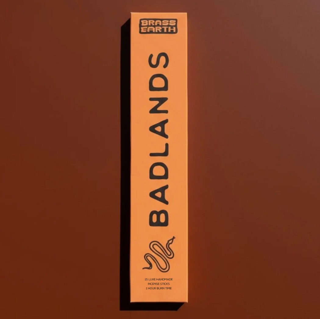 Box of 'Badlands' Incense by Brass Earth on a brown background