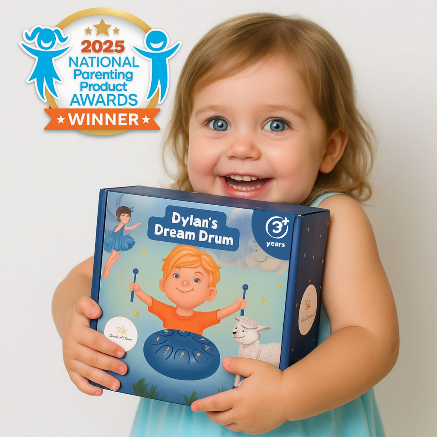 Child holding a toy named 'Dylan's Dream Drum' with 2025 National Parenting Product Awards winner badge.