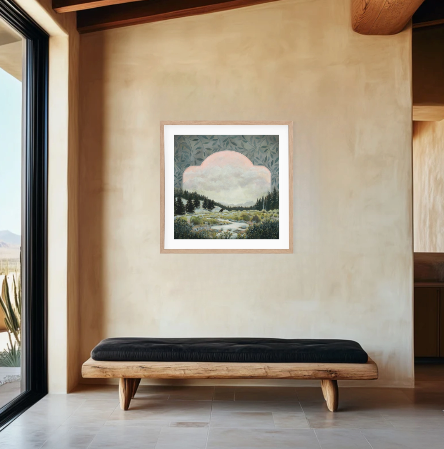 Framed artwork on a wall in a modern interior setting with a bench below.