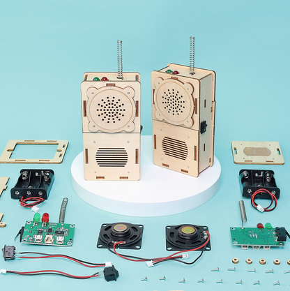 Wooden electronic devices with components on a blue background
