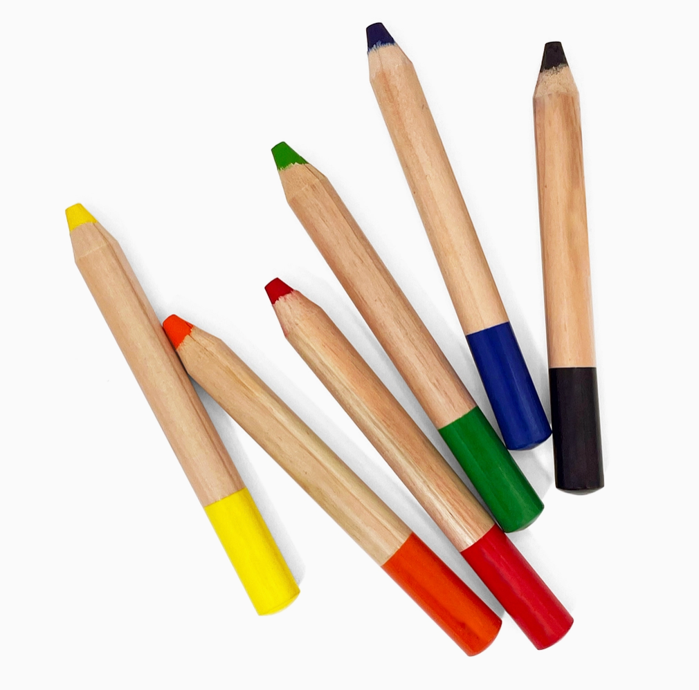 Set of colorful watercolor crayons with wooden bodies on a white background