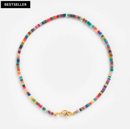 Colorful beaded necklace with a gold clasp on a white background, labeled as a bestseller.