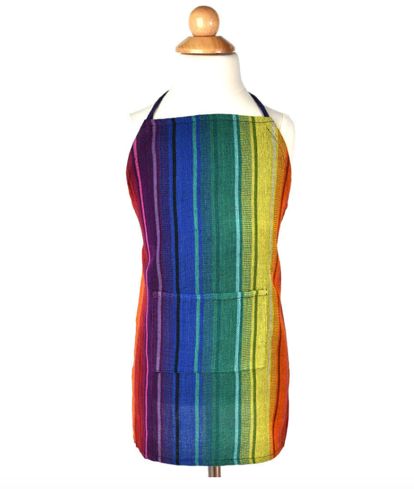 Colorful child striped apron on a mannequin against a white background