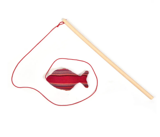 Red Cat fish toy with a string and wooden rod on a white background