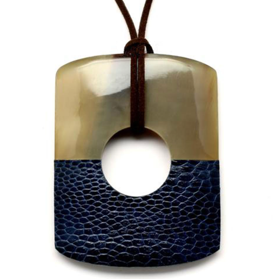 Necklace with a unique pendant featuring a blue leatherbase and horn top on a white background