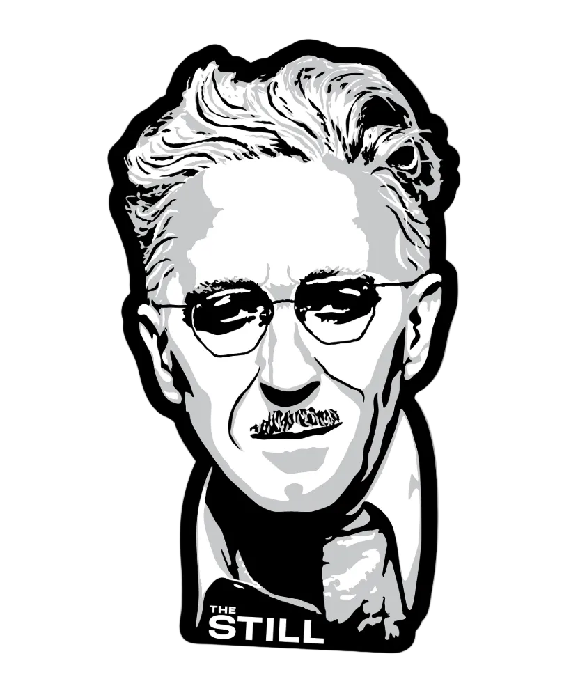 A die-cut vinyl sticker featuring a stylized black and white graphic portrait of a man with glasses and the text 'THE STILL' at the bottom, shown on a light gray background.