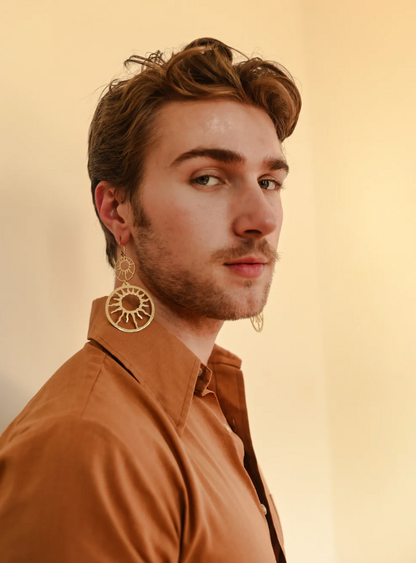 Model wearing Sol Statement Earrings.