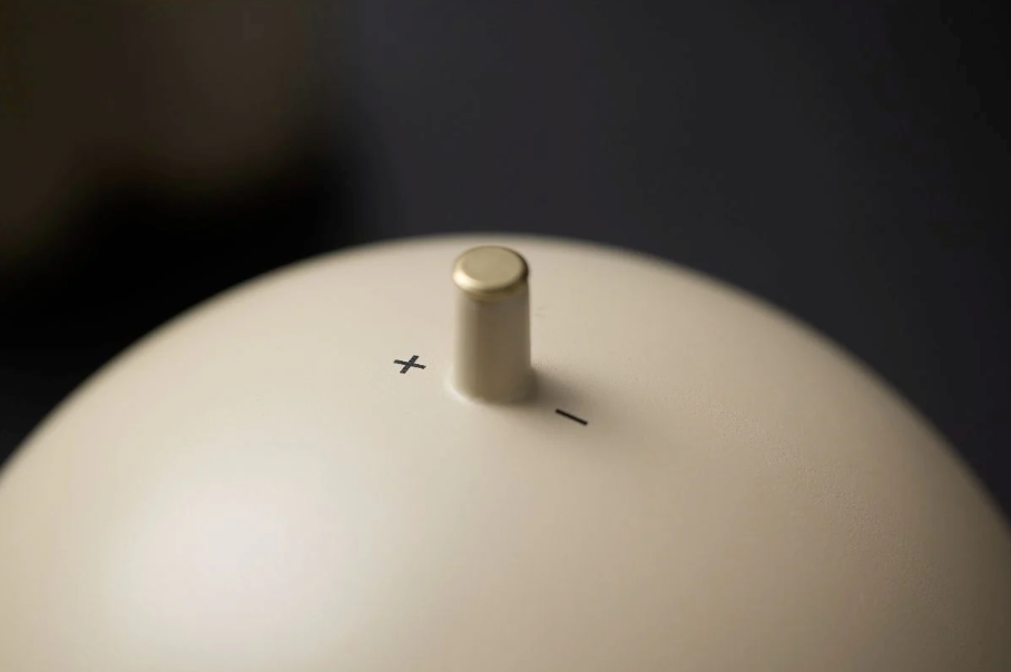 Close-up of the on and of button on a dark background