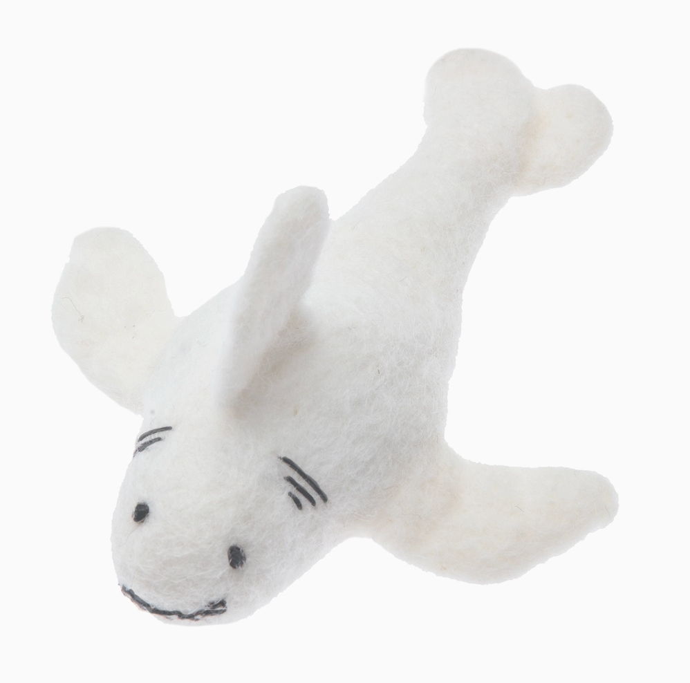 White plush shark toy on a white background