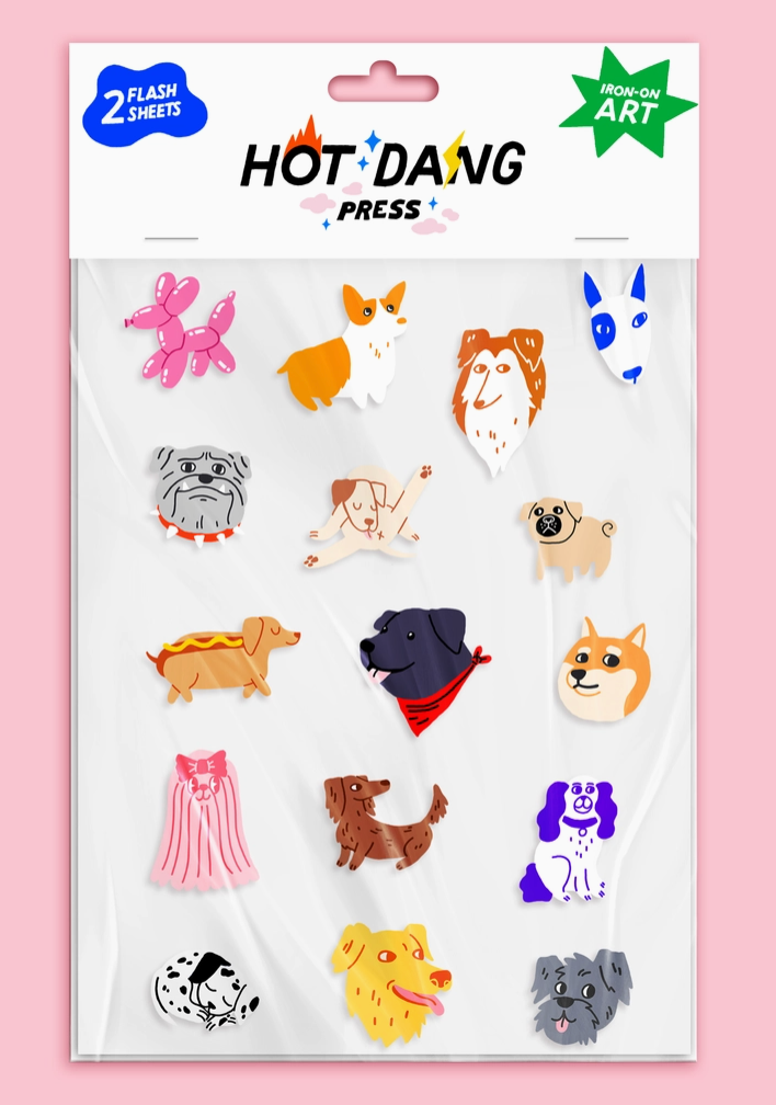 Pack of Hot Dang Press iron-on art with various dog illustrations on a pink background