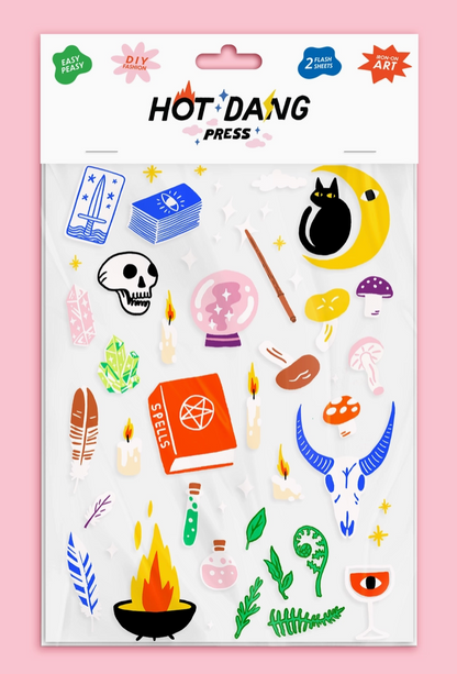 Sheet of colorful ion-on decals with various designs on a white background, featuring the brand 'Hot Dang Press'.