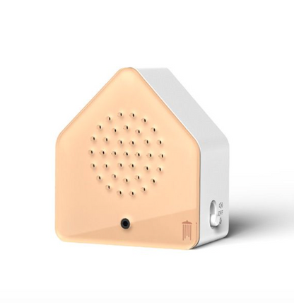 Beige and white triangular sound box on a white background