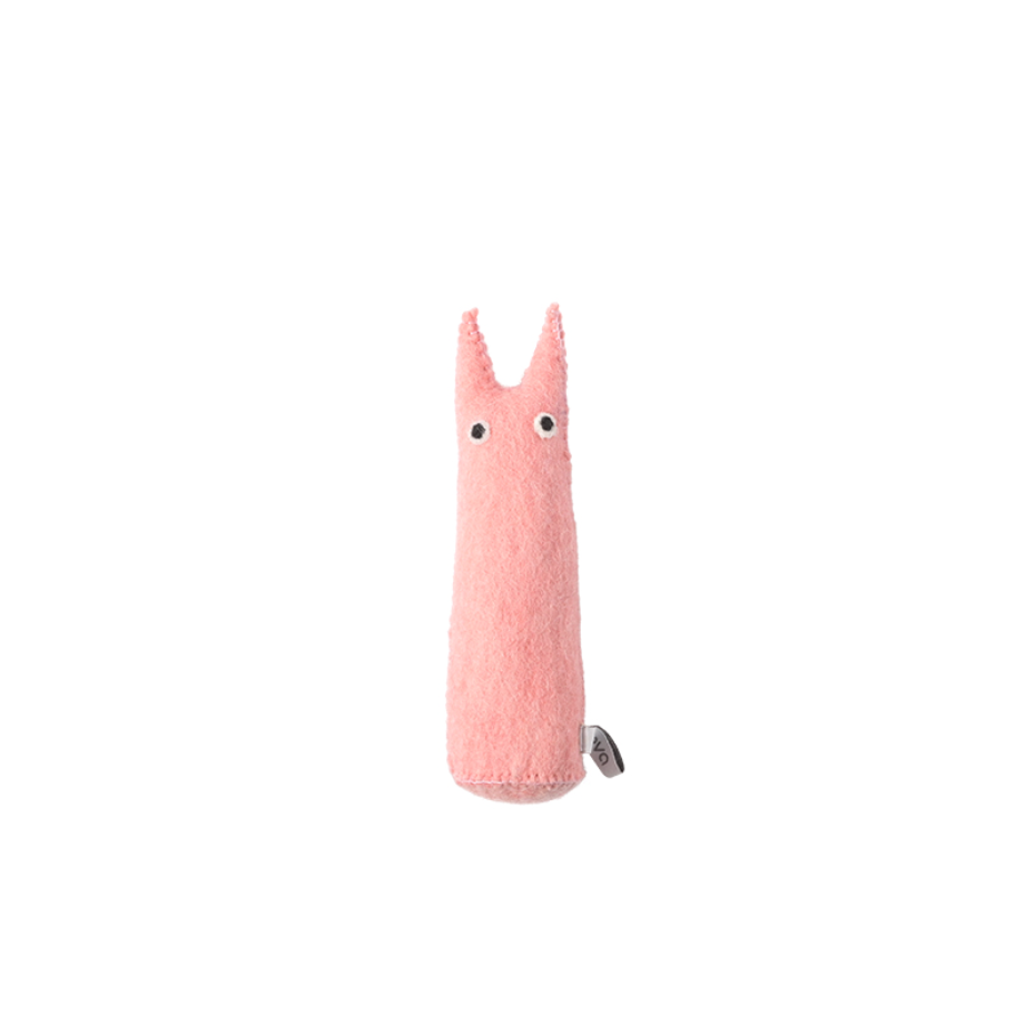 Pink plush figure with a face on a white background