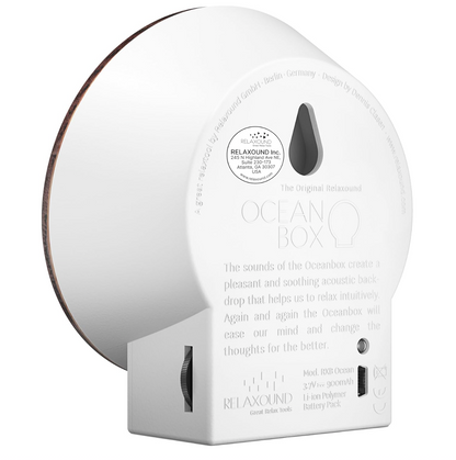 White ocean sound machine with branding on a white background