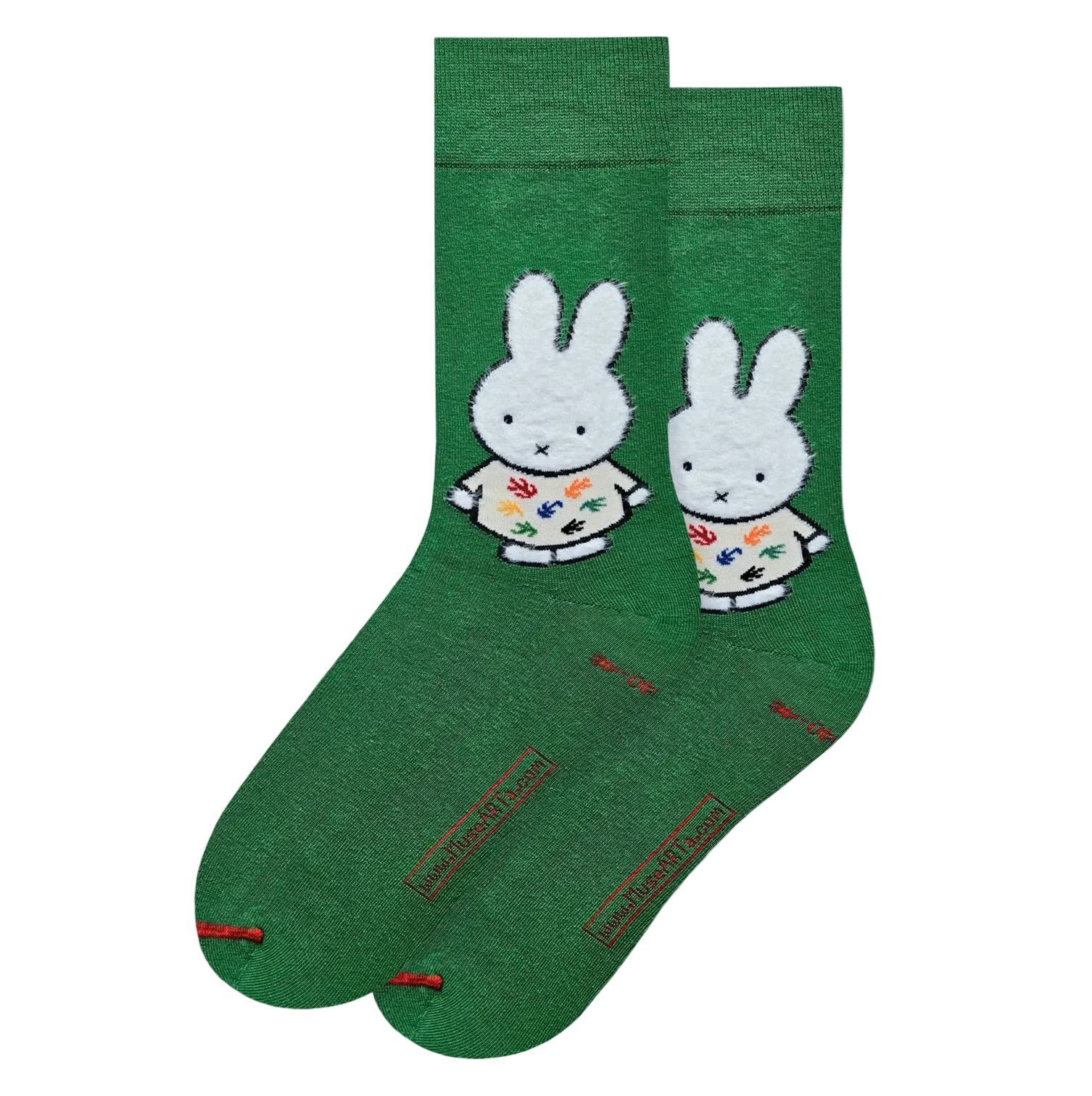 Green socks with a Miffy design on a light gray background