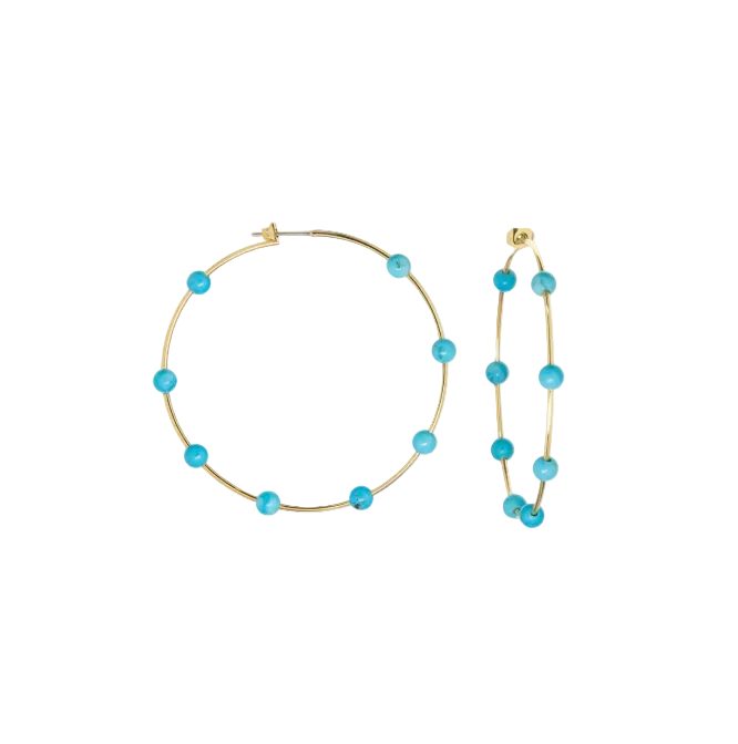 Gold hoop earrings with small turquoise blue beads spaced along the wire, displayed on a clean light gray background.