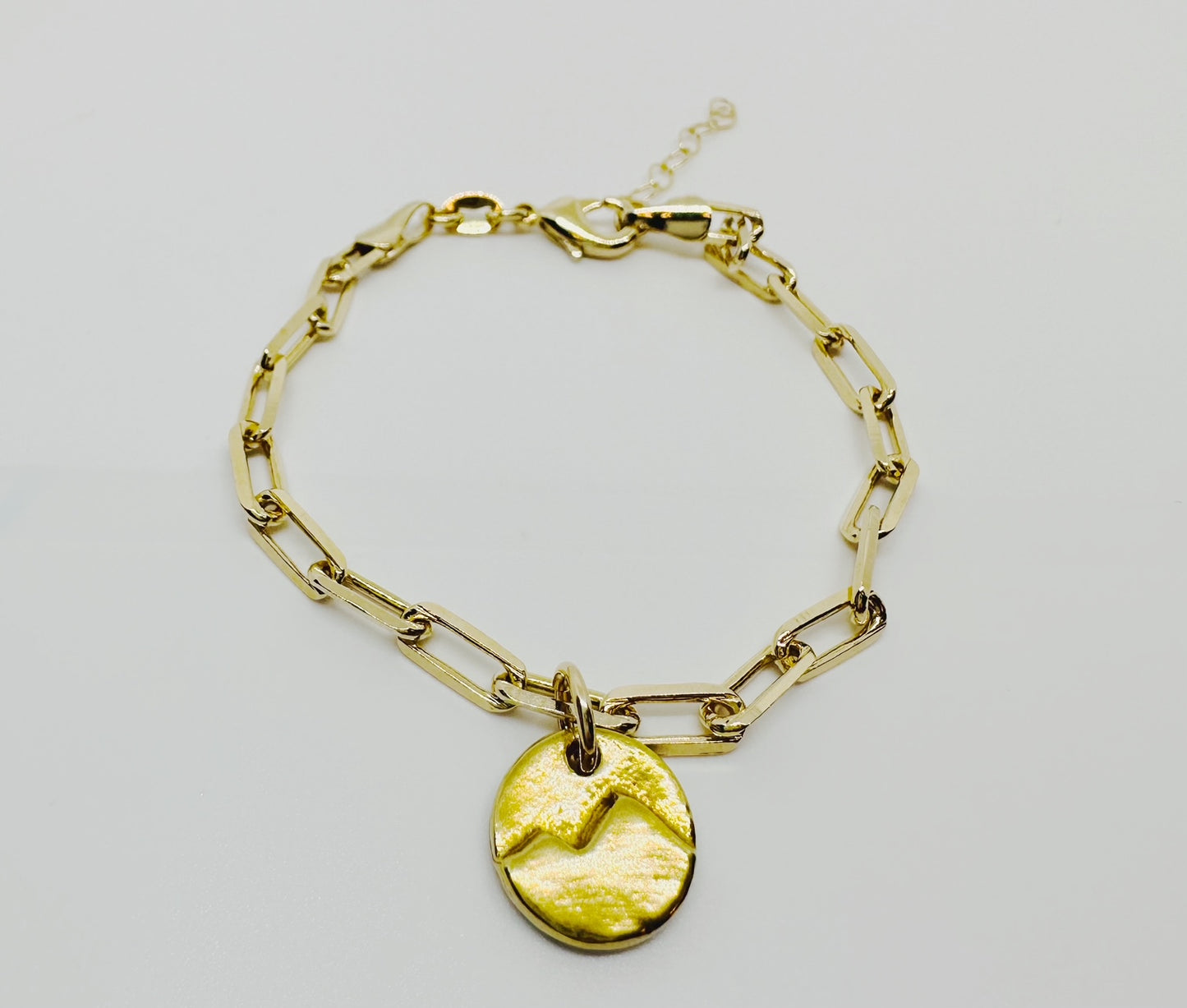 Mountain Link Bracelet. Gold-fill chain with a bronze mountain charm, handmade with a precious metal clay process. 
