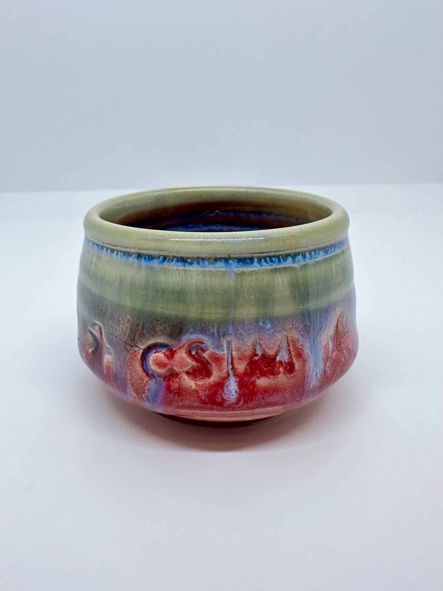 Handmade ‘Small Planter 2’ with CSM logo and colorful drippy glaze 