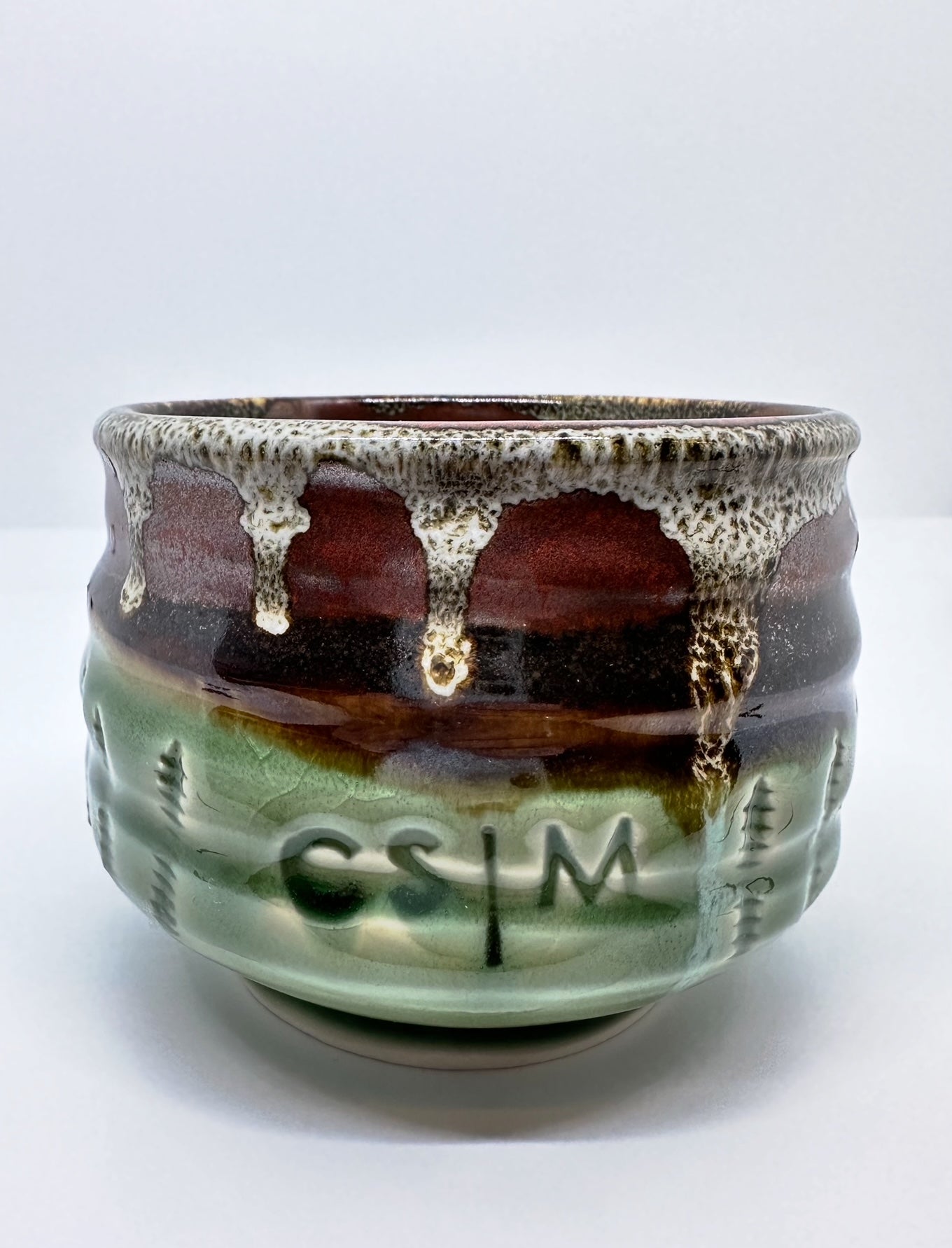 Handmade ‘Medium Planter/2’ with CSM logo and drip glaze.