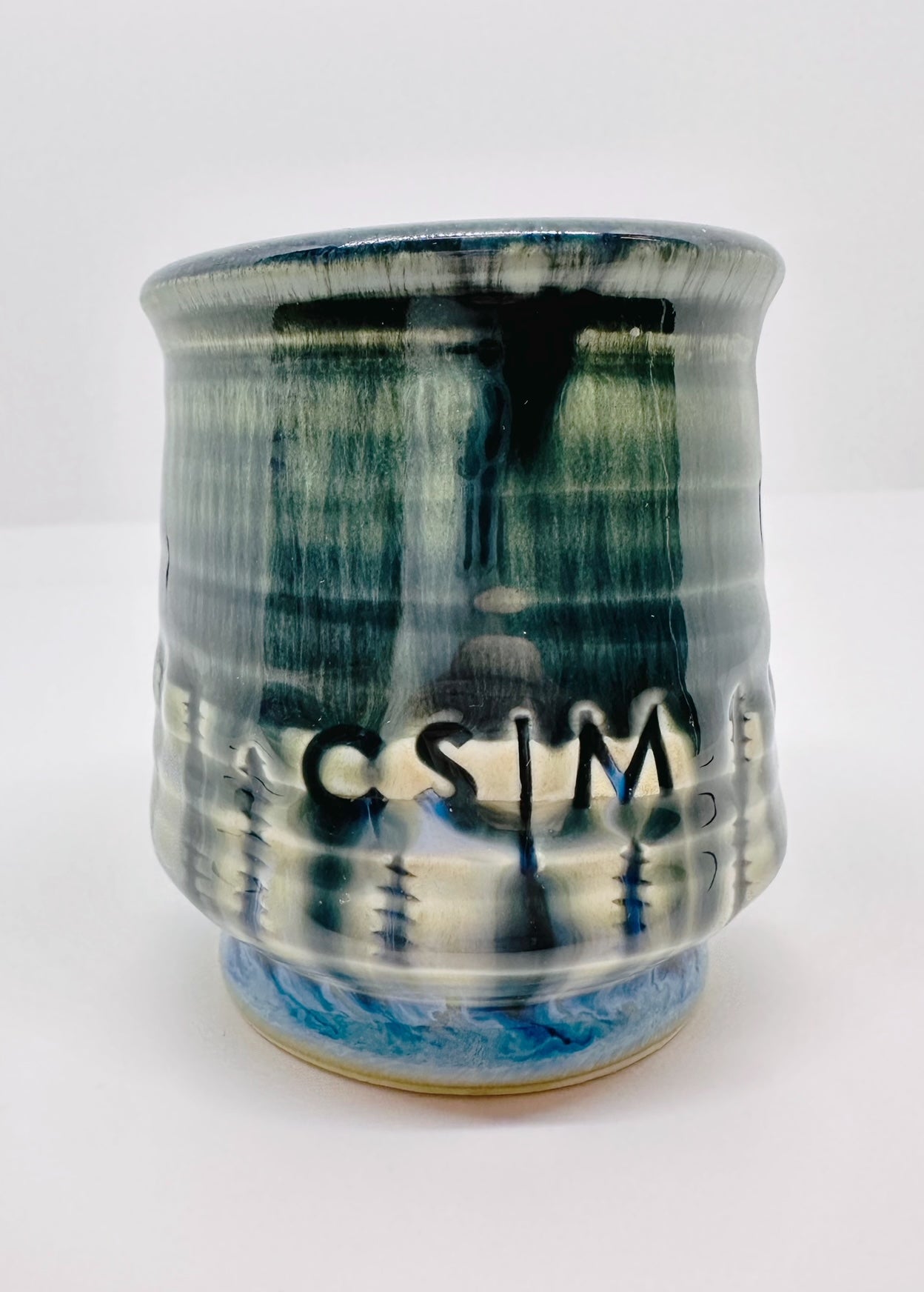 Handmade ‘Small Planter 4’ with CSM logo and colorful drippy glaze 