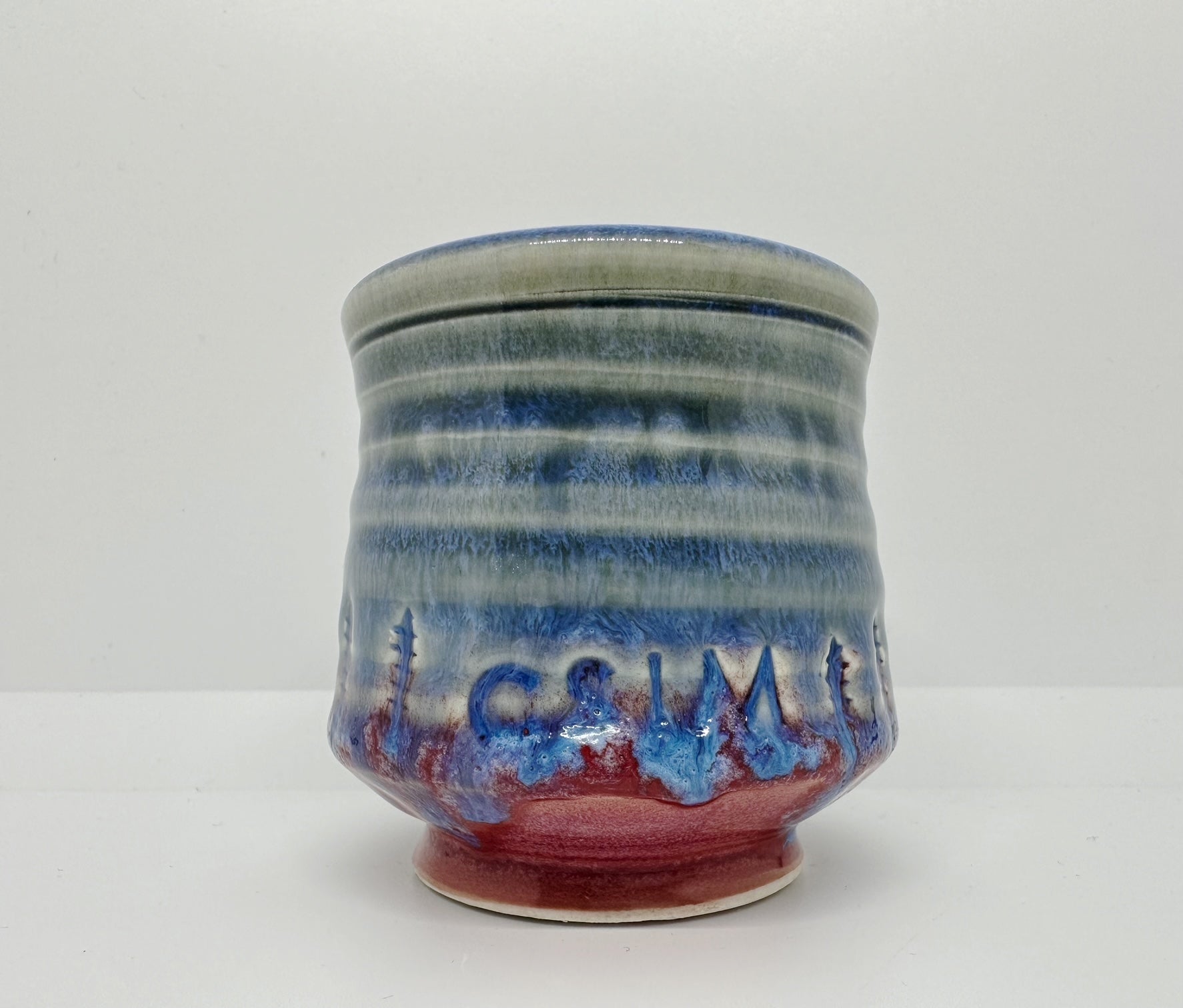 Handmade ‘Small Planter 6’ with CSM logo and colorful drippy glaze 