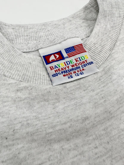 Detail photo of the tag from Youth T-shirt: Colorfully Courageous