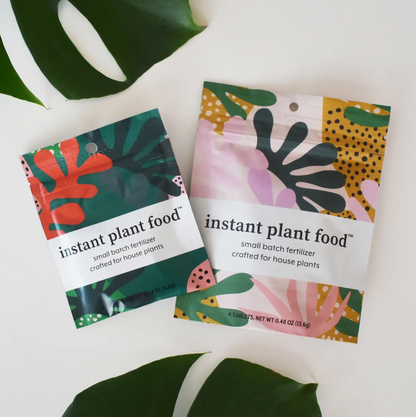Instant Plant Food (2 variants) in bright illustrated packaging