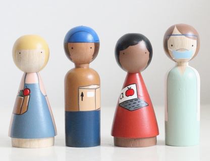 Wooden Essential Worker dolls: A clerk, a delivery person, a teacher, and a healthcare worker