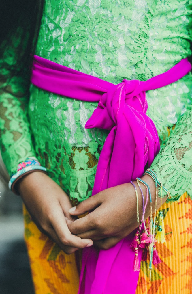 Close-up photo of woman wearing Bali Unity Beaded Bracelets